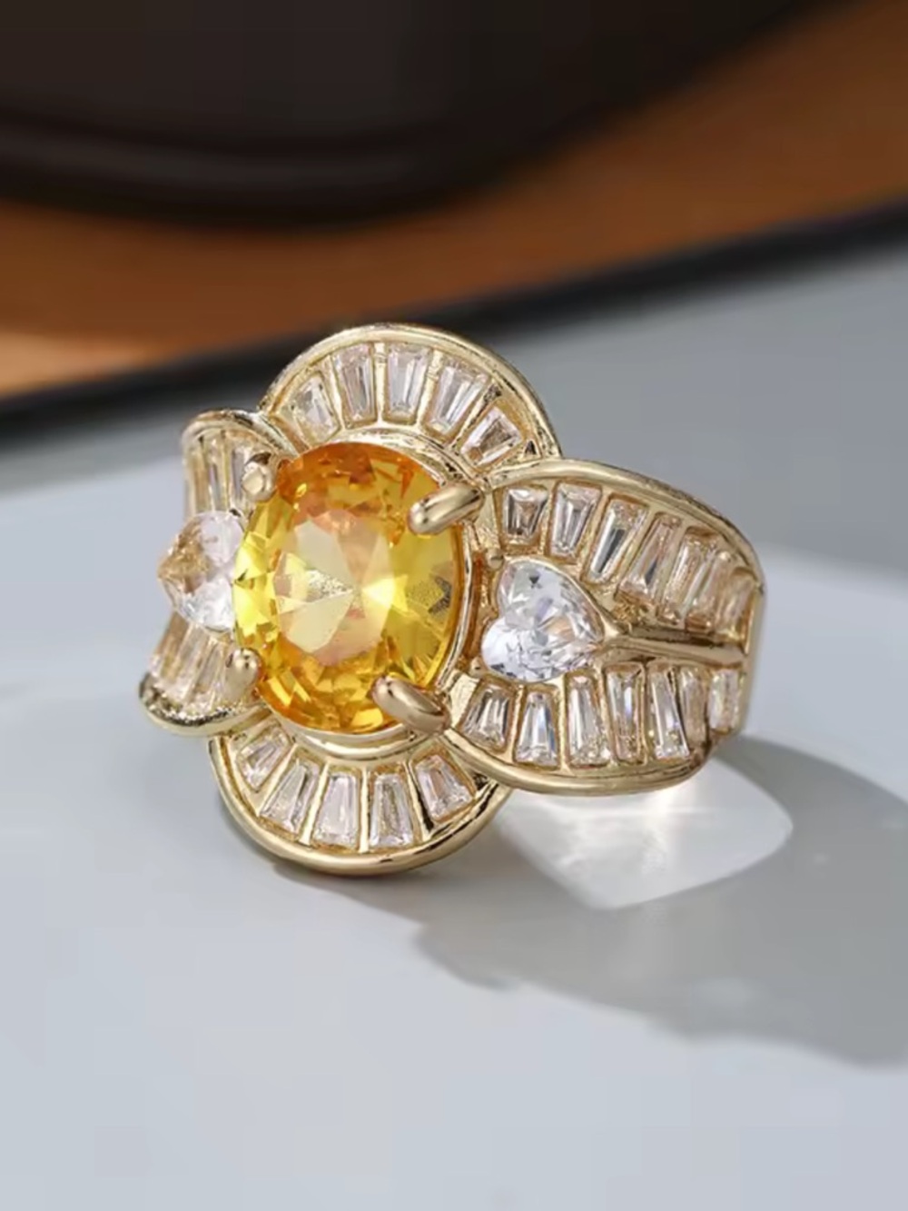 Gold Ring with Yellow Zirconia Center and Clear Accent Stones